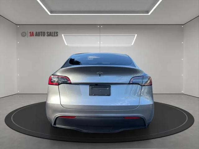 used 2024 Tesla Model Y car, priced at $36,995