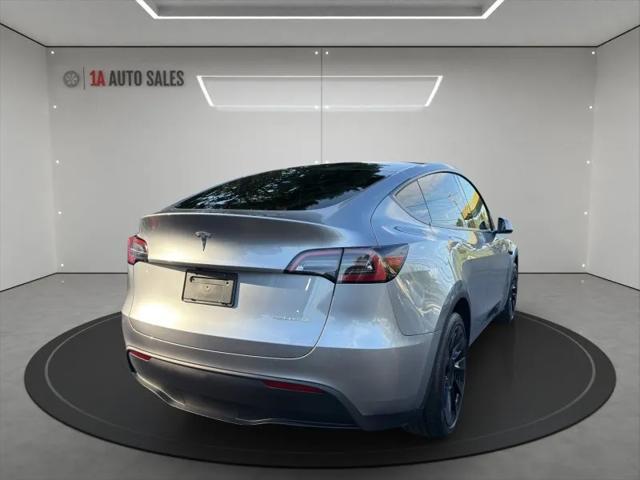 used 2024 Tesla Model Y car, priced at $36,995