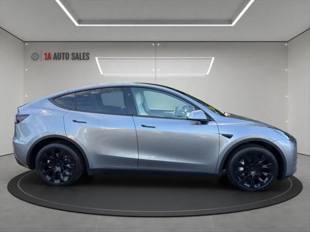 used 2024 Tesla Model Y car, priced at $36,995
