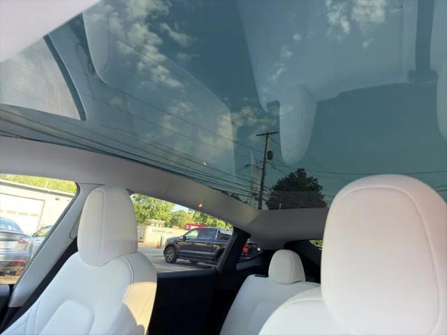 used 2024 Tesla Model Y car, priced at $36,995