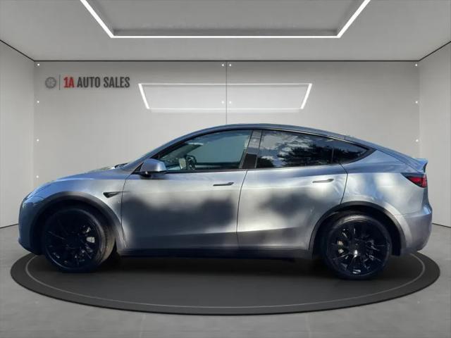used 2024 Tesla Model Y car, priced at $36,995