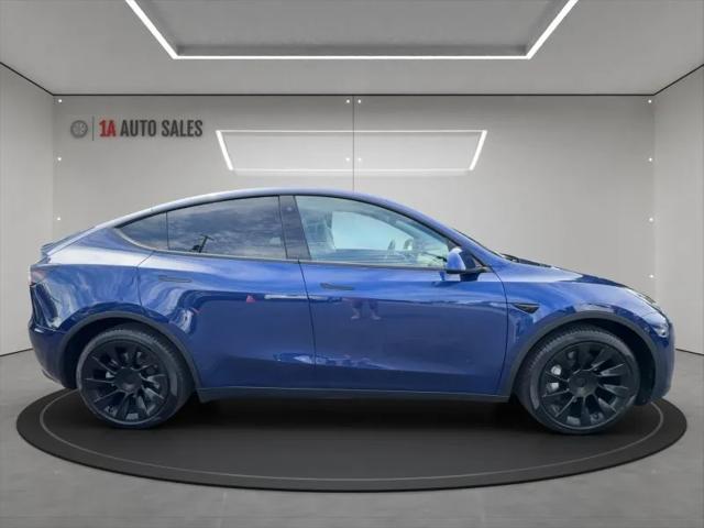 used 2021 Tesla Model Y car, priced at $27,995