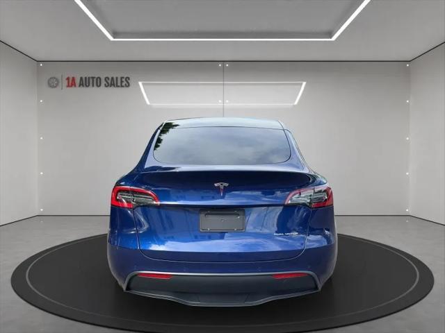 used 2021 Tesla Model Y car, priced at $27,995