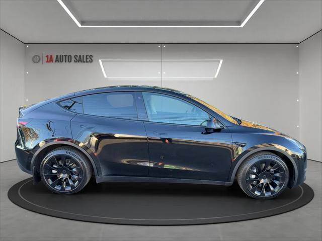 used 2021 Tesla Model Y car, priced at $26,995