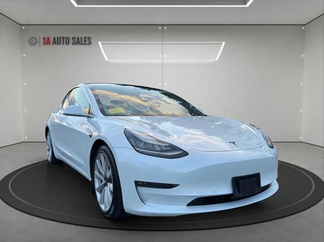 used 2018 Tesla Model 3 car, priced at $19,995