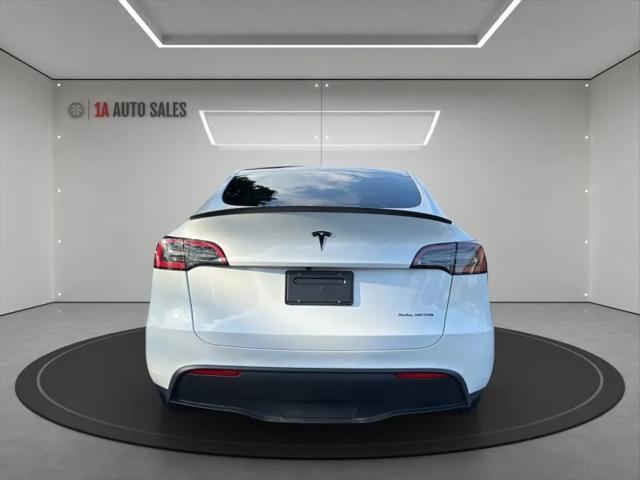 used 2023 Tesla Model Y car, priced at $28,495