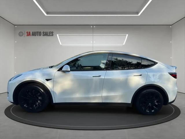 used 2023 Tesla Model Y car, priced at $28,495