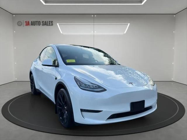 used 2023 Tesla Model Y car, priced at $28,495