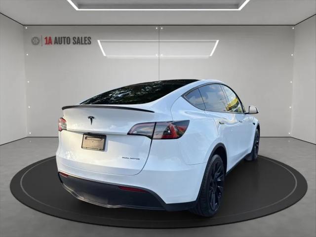 used 2023 Tesla Model Y car, priced at $28,495