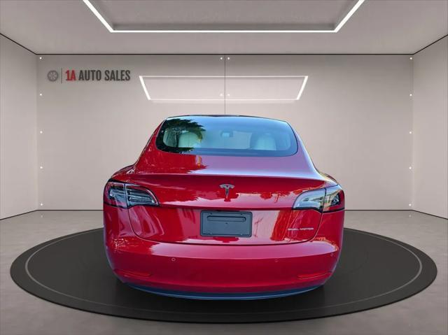 used 2021 Tesla Model 3 car, priced at $27,995