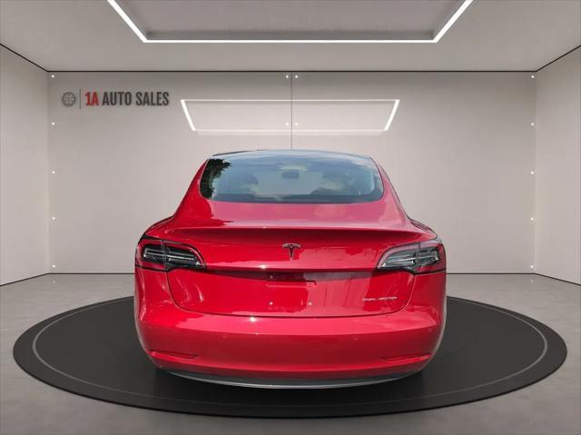 used 2018 Tesla Model 3 car, priced at $26,995