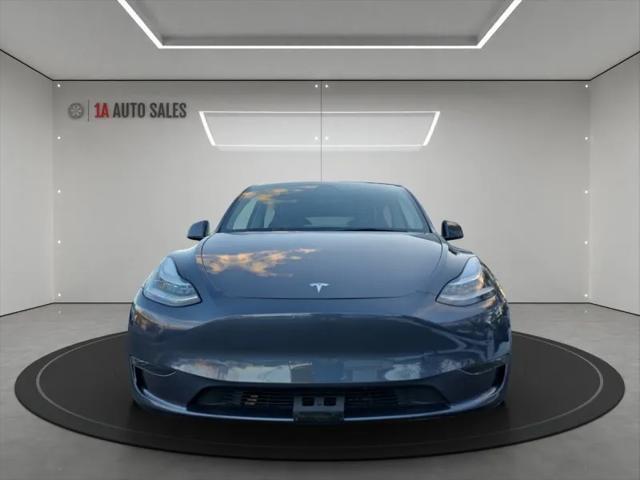 used 2023 Tesla Model Y car, priced at $34,995