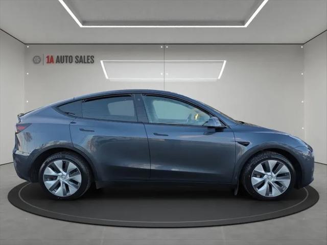 used 2023 Tesla Model Y car, priced at $34,995