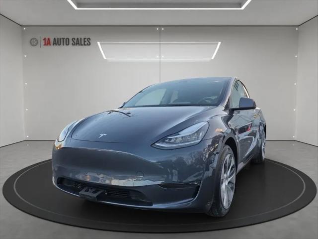 used 2023 Tesla Model Y car, priced at $34,995