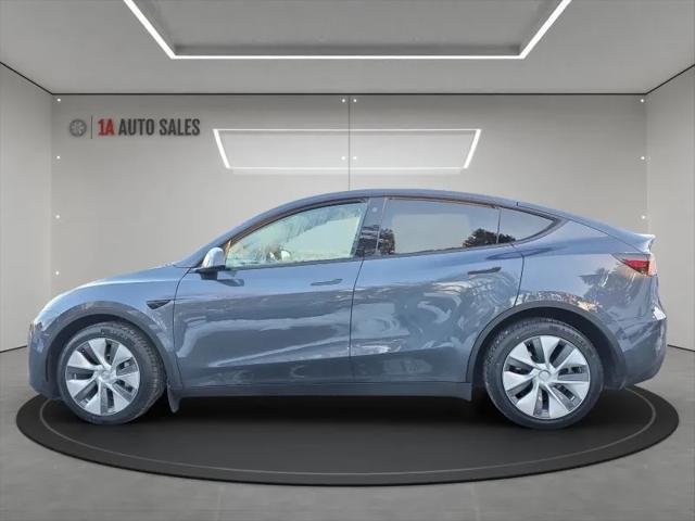 used 2023 Tesla Model Y car, priced at $34,995