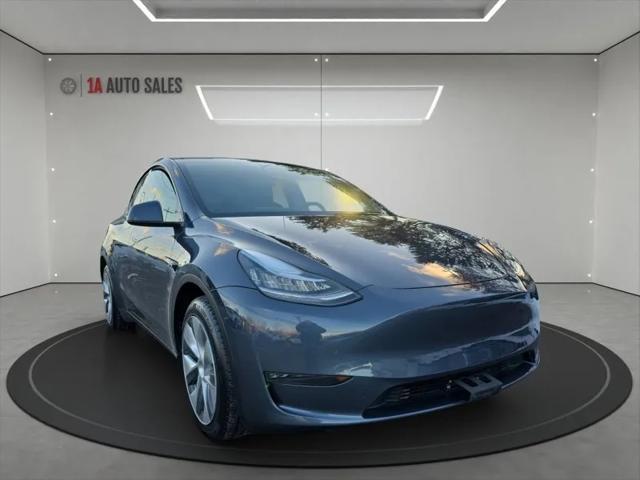 used 2023 Tesla Model Y car, priced at $34,995