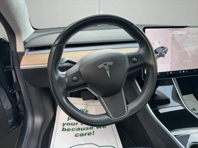 used 2017 Tesla Model 3 car, priced at $24,495