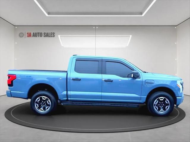 used 2023 Ford F-150 Lightning car, priced at $44,495