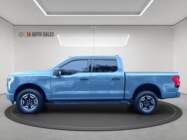 used 2023 Ford F-150 Lightning car, priced at $44,495