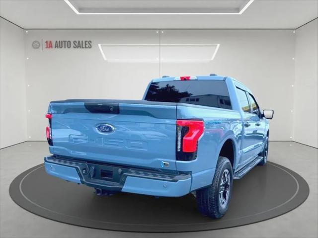 used 2023 Ford F-150 Lightning car, priced at $44,495