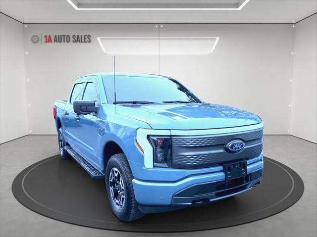 used 2023 Ford F-150 Lightning car, priced at $44,495