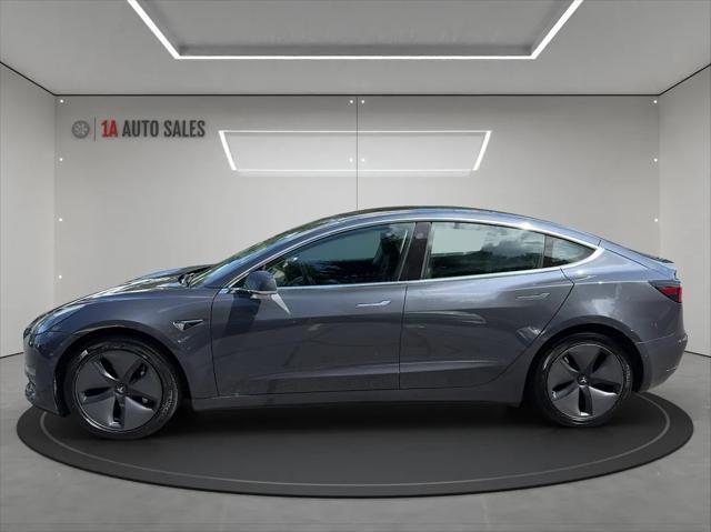 used 2018 Tesla Model 3 car, priced at $22,995