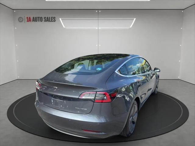 used 2018 Tesla Model 3 car, priced at $22,995