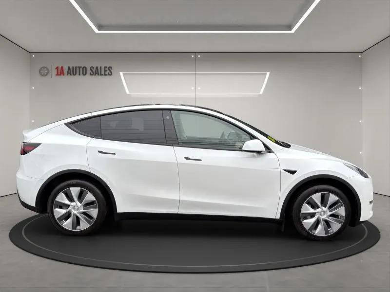 used 2023 Tesla Model Y car, priced at $28,995