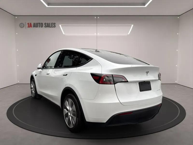 used 2023 Tesla Model Y car, priced at $28,995