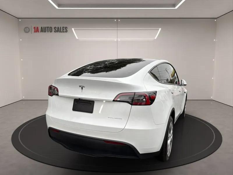 used 2023 Tesla Model Y car, priced at $28,995