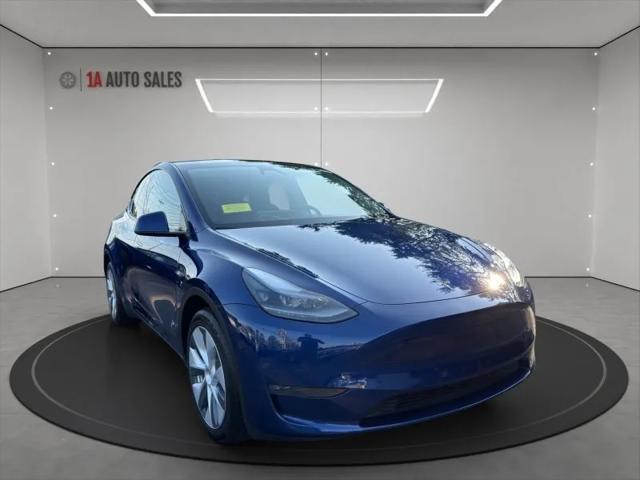 used 2024 Tesla Model Y car, priced at $27,995
