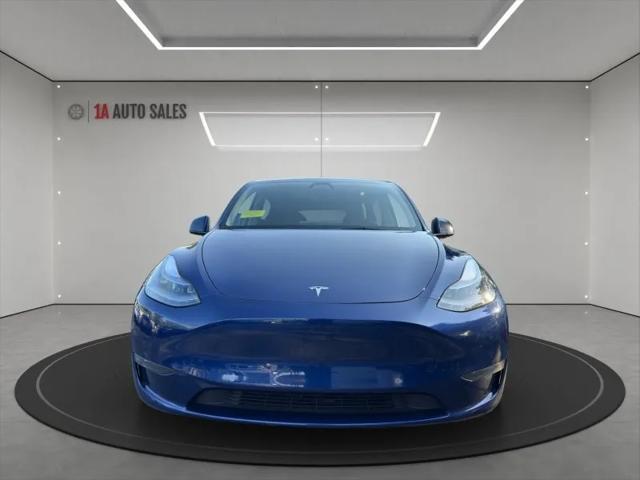 used 2024 Tesla Model Y car, priced at $27,995