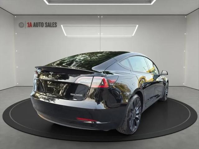 used 2022 Tesla Model 3 car, priced at $25,995