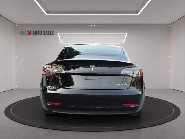 used 2022 Tesla Model 3 car, priced at $25,995