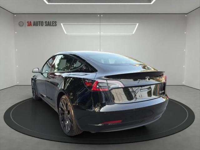 used 2022 Tesla Model 3 car, priced at $25,995