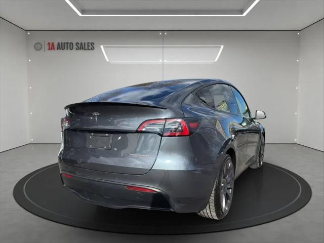 used 2021 Tesla Model Y car, priced at $27,995