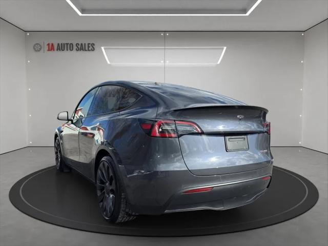 used 2021 Tesla Model Y car, priced at $27,995