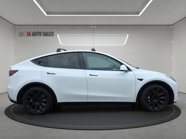 used 2021 Tesla Model Y car, priced at $29,495