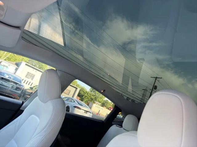used 2023 Tesla Model Y car, priced at $31,495