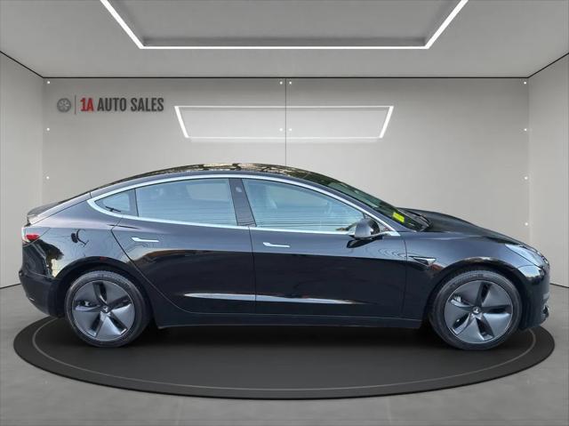 used 2018 Tesla Model 3 car, priced at $27,495