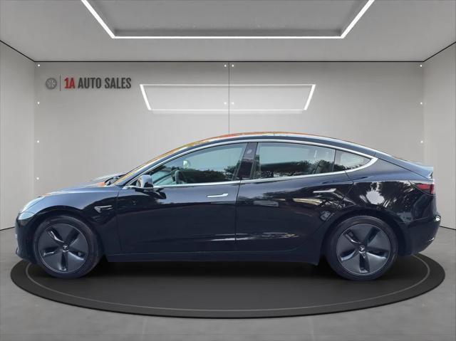 used 2018 Tesla Model 3 car, priced at $27,495