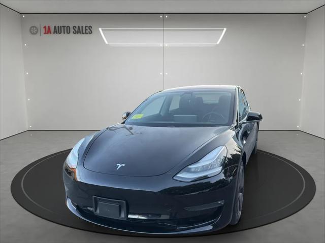 used 2018 Tesla Model 3 car, priced at $27,495