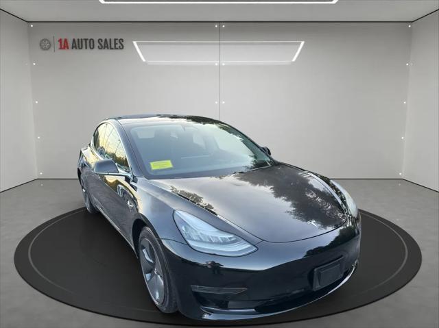 used 2018 Tesla Model 3 car, priced at $27,495