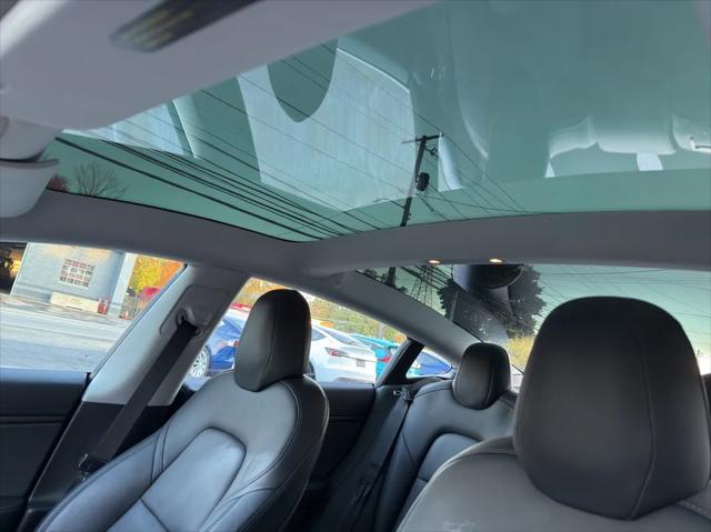 used 2018 Tesla Model 3 car, priced at $27,495