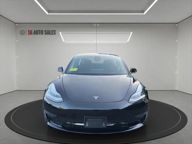 used 2018 Tesla Model 3 car, priced at $27,495