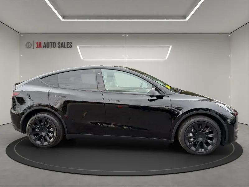 used 2023 Tesla Model Y car, priced at $29,995