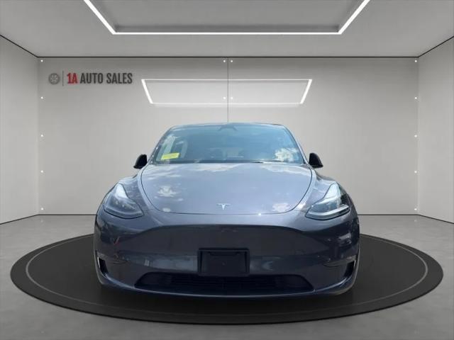 used 2023 Tesla Model Y car, priced at $30,995