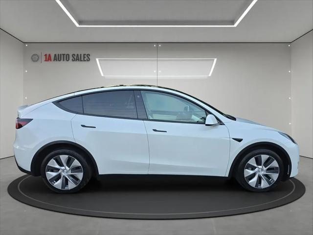 used 2021 Tesla Model Y car, priced at $30,995