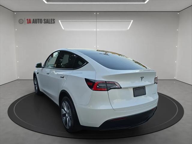 used 2021 Tesla Model Y car, priced at $30,995