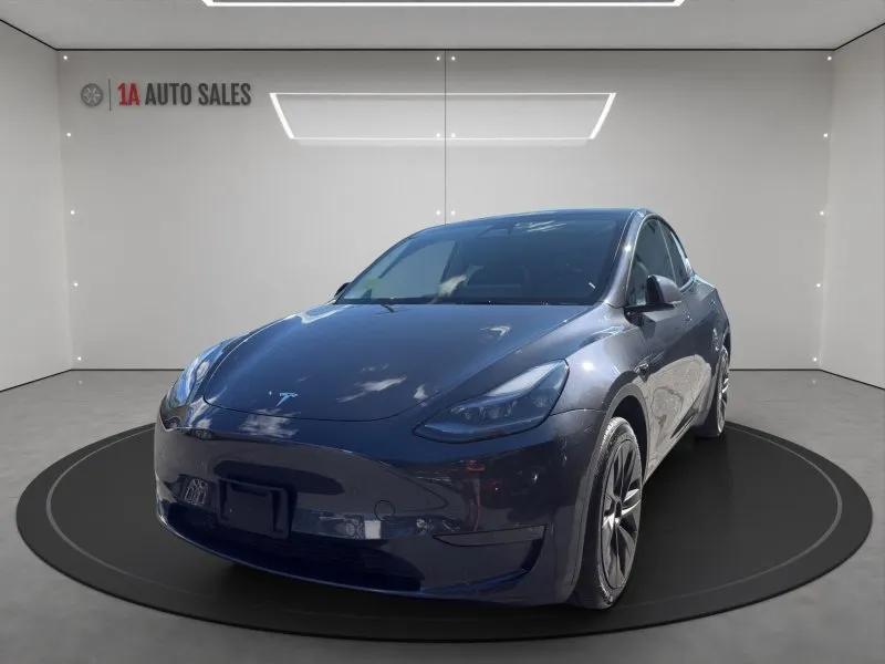 used 2025 Tesla Model Y car, priced at $39,495